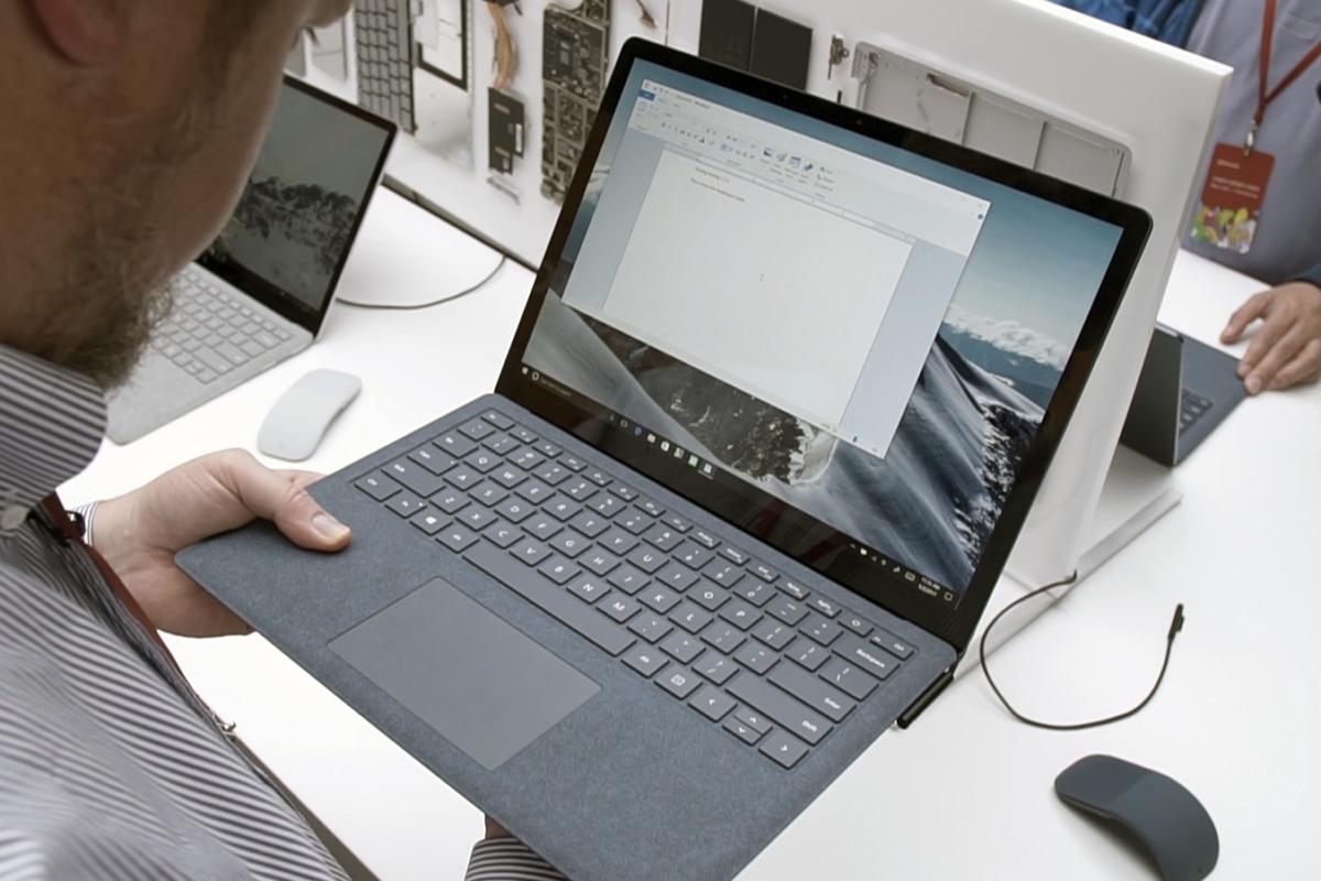 surface laptop holding