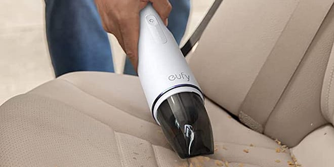 Handheld vacuum cleaning seats in car