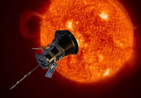 A spacecraft with the sun in the background.